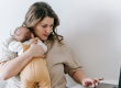 Busy mom working with baby